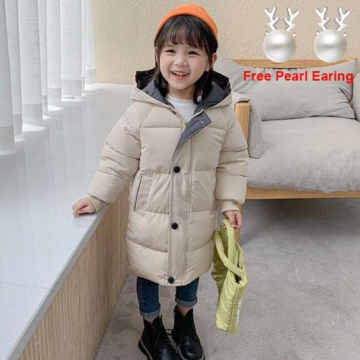2832451887090.jpg A happy child staying warm in the snow wearing a stylish kids thick winter coat.