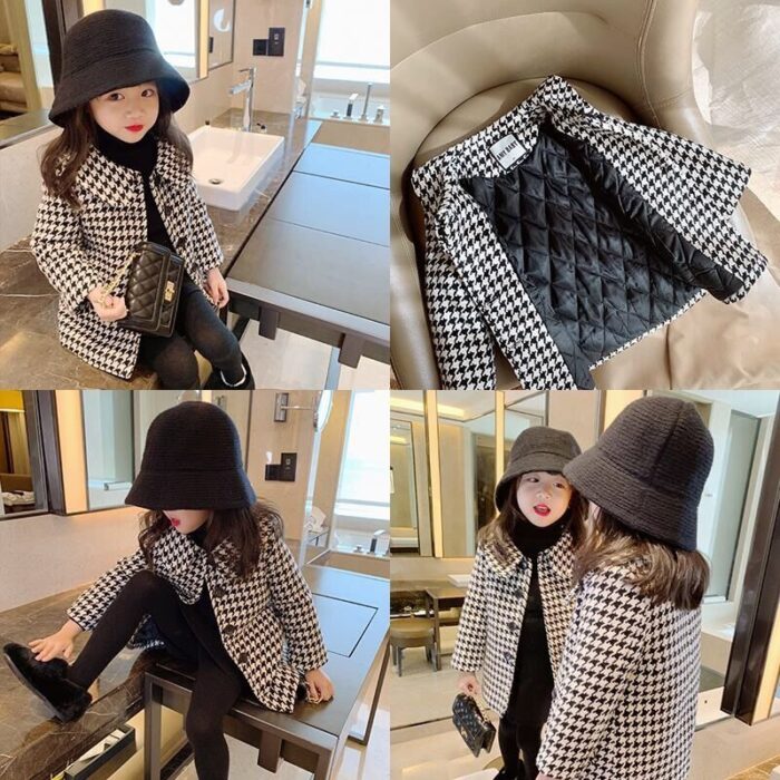 A cute toddler wearing a stylish toddler fall and winter coat for cold weather.