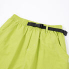 Close-up of the water-repellent nylon fabric and elastic drawstring on waterproof outdoor pants for kids.