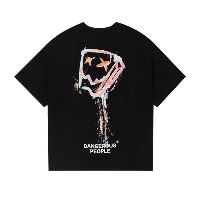 2aff4def-c4bd-4b77-b3fa-bb33060f2163.jpg A stylish man wearing a trendy mens oversized graphic t shirt with a paint splatter design.