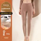 Stylish woman staying warm in thick womens thermal winter leggings for travel.