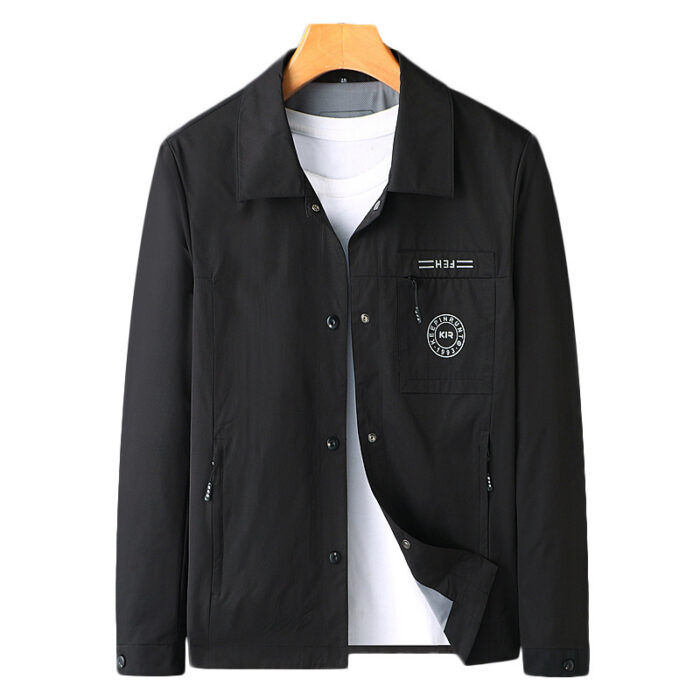 A stylish man wearing a sleek mens wrinkle free casual jacket for a smart everyday look.