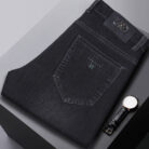 A stylish man wearing comfortable mens straight leg jeans ph for a business casual look.