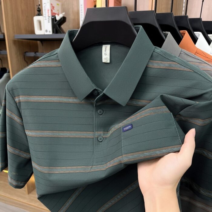 A stylish man wearing a comfortable mens striped polo shirt for a smart casual weekend look.