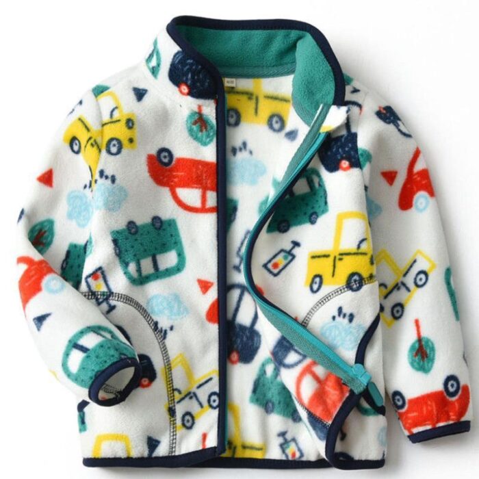 422555392618.jpg A happy child wearing a comfortable kids lightweight zip up jacket ready for outdoor play.