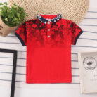 A handsome little boy wearing a breathable boys cotton polo shirt ph for a family weekend outing.