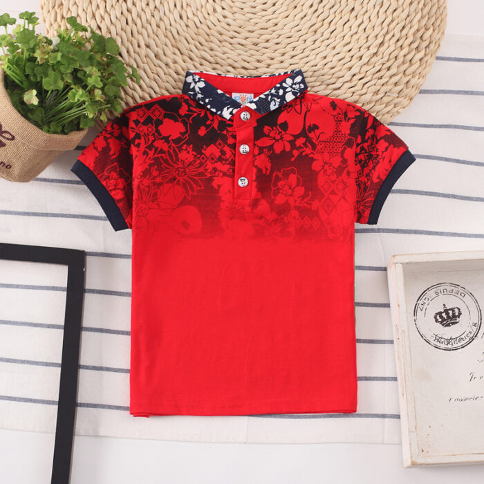 4229f0a3-00b2-4a31-a871-0f325bb28302.jpg A handsome little boy wearing a breathable boys cotton polo shirt ph for a family weekend outing.