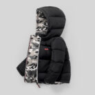 Close-up of the thick thermal cotton insulation and smooth zipper on a kids padded winter jacket.