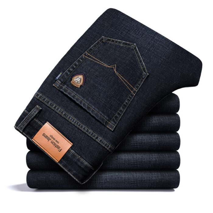 51462757-ac60-4ff3-871c-73b20f82a51d.jpg Handsome young man wearing comfortable mens straight leg jeans.