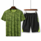 Athletic man working out wearing a breathable mens sports terno set.