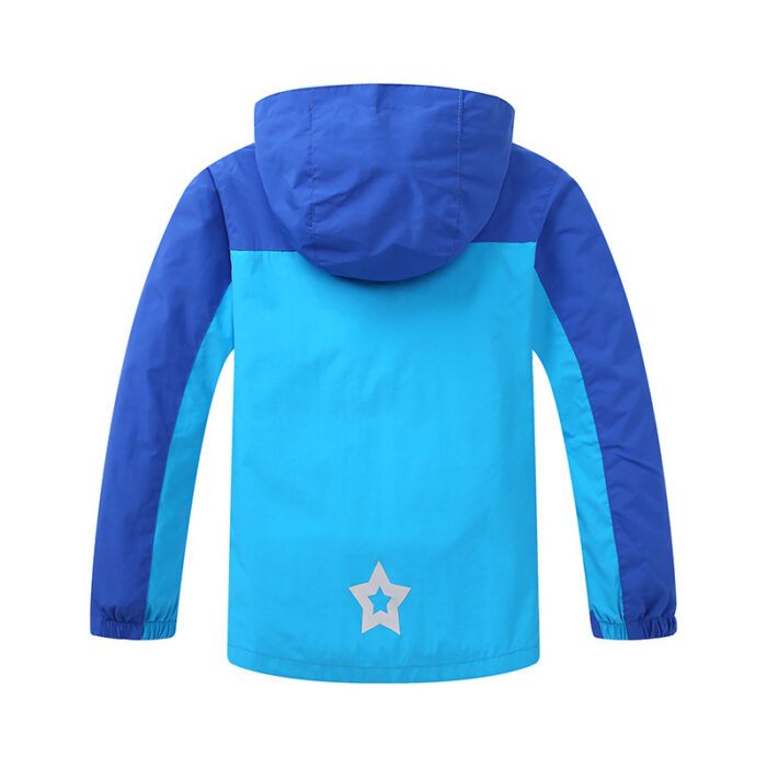 Close-up of the ultra-soft brushed fabric and sturdy zipper on a youth lightweight fall coat.