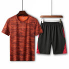 Athletic man working out wearing a breathable mens sports terno set.