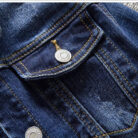 A stylish woman wearing a versatile womens slim fit denim jacket for a casual everyday look.