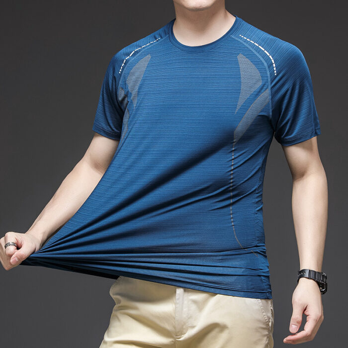 A man staying cool in the summer heat wearing a breathable mens ice silk t shirt.