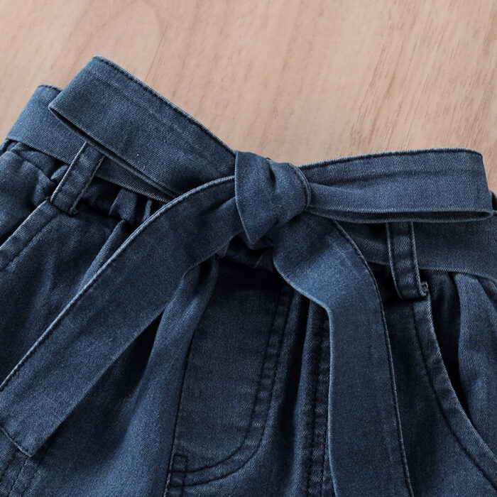 60ae0dff-b8c0-4ddf-8711-1654df0c5bab.jpg Cute little girl wearing a trendy blue girls denim crop top terno.