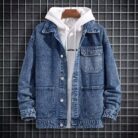 A stylish man wearing a versatile mens hooded denim jacket for a casual layered streetwear look.