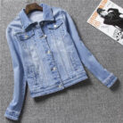 A stylish woman wearing a versatile womens slim fit denim jacket for a casual everyday look.