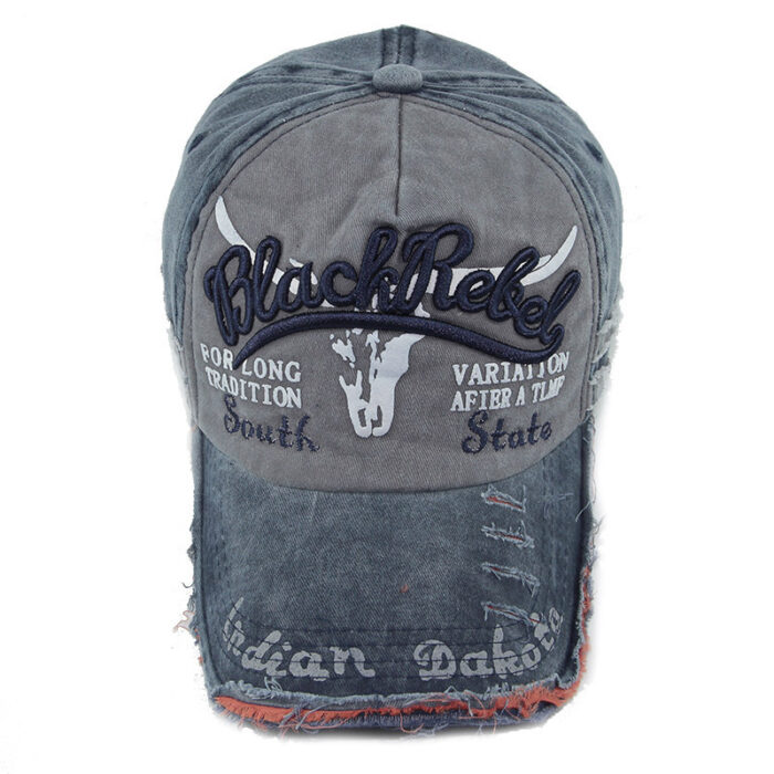 Close-up of the premium breathable cotton and classic curved brim on a distressed classic dad hat.
