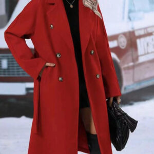 Close-up of the adjustable belt and classic lapel on a double breasted coat for women.