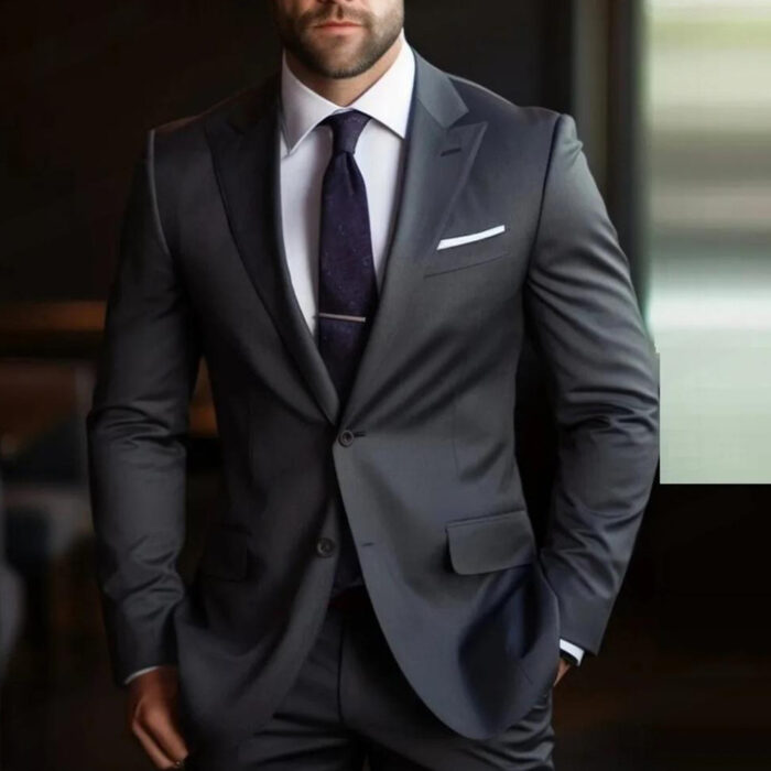 64451d7d-ca6d-4a6a-b152-82568f7dfcaa.jpg Handsome young man wearing a stylish mens slim fit two piece suit.
