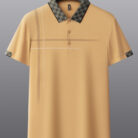 A professional man wearing a classic mens cotton polo shirt ph for a smart casual office look.