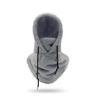 Person staying warm while wearing a thick winter fleece balaclava hat.