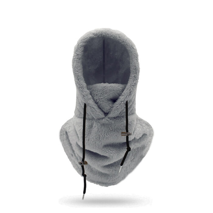 Person staying warm while wearing a thick winter fleece balaclava hat.