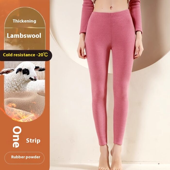 Stylish woman staying warm in thick womens thermal winter leggings for travel.