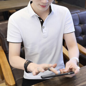 A stylish man wearing a classic mens short sleeve polo shirt for a smart-casual everyday look.