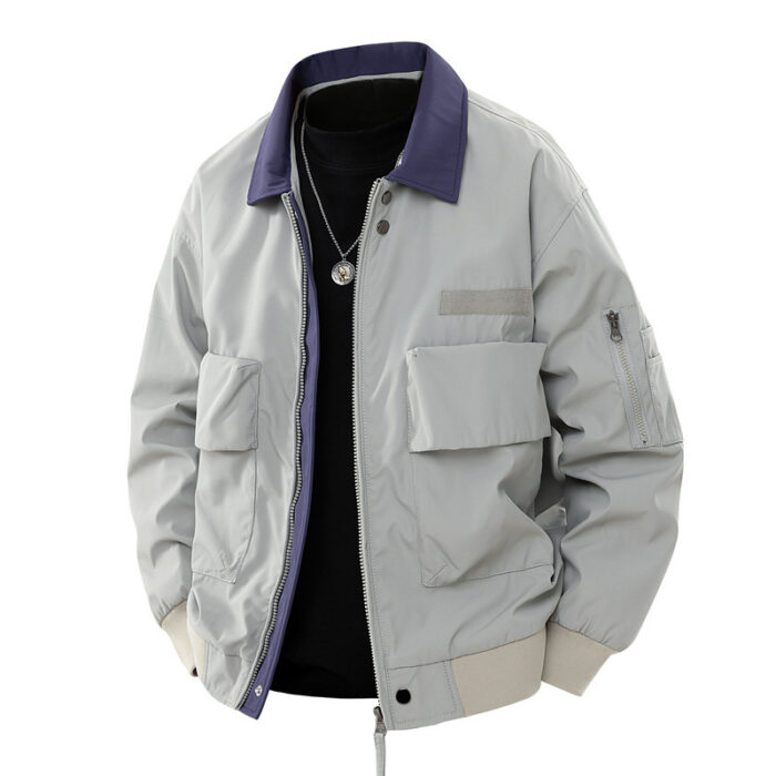 A stylish man wearing a loose fit mens retro pilot jacket for a casual streetwear look.