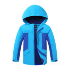 Close-up of the ultra-soft brushed fabric and sturdy zipper on a youth lightweight fall coat.
