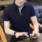 A stylish man wearing a classic mens short sleeve polo shirt for a smart-casual everyday look.