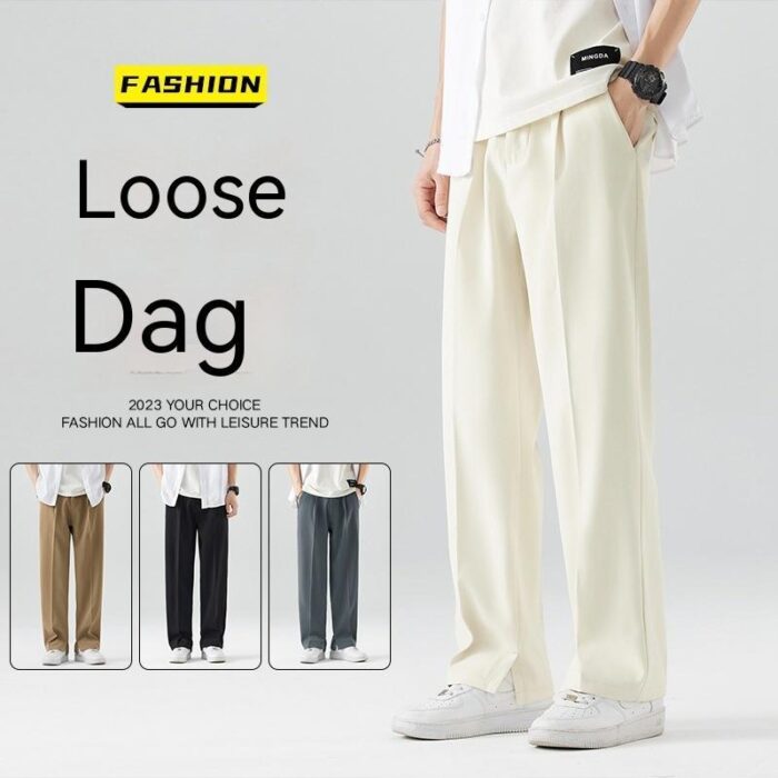 88070f95-b6f4-4595-bd5e-ddb3874885c4_trans.jpeg A stylish man wearing comfortable mens casual suit pants for a smart casual office look.