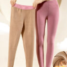 Stylish woman staying warm in thick womens thermal winter leggings for travel.