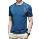 A man staying cool in the summer heat wearing a breathable mens ice silk t shirt.