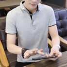 A stylish man wearing a classic mens short sleeve polo shirt for a smart-casual everyday look.