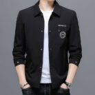 A stylish man wearing a sleek mens wrinkle free casual jacket for a smart everyday look.