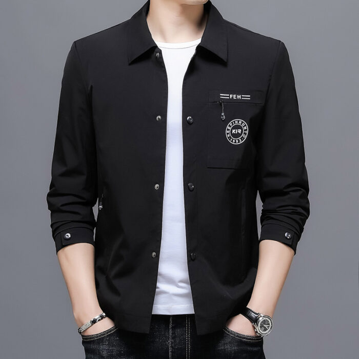 A stylish man wearing a sleek mens wrinkle free casual jacket for a smart everyday look.