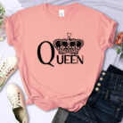 Close-up of the bold crown print and breathable fabric on a crown print cotton shirt.