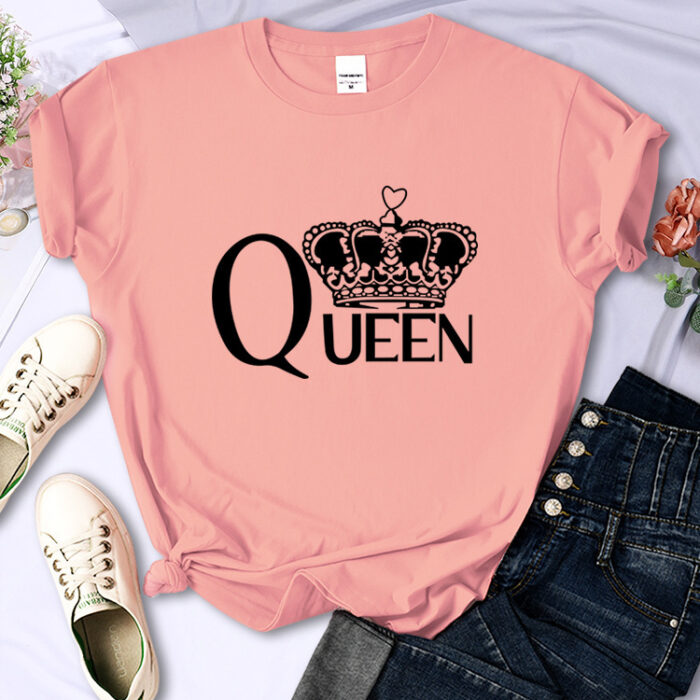 99671cae-a9a8-441e-b5e2-8c1672dc0e8c.jpg Close-up of the bold crown print and breathable fabric on a crown print cotton shirt.