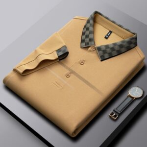 A professional man wearing a classic mens cotton polo shirt ph for a smart casual office look.