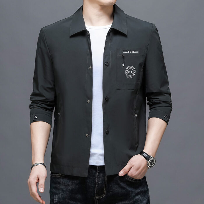A stylish man wearing a sleek mens wrinkle free casual jacket for a smart everyday look.