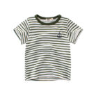 A cute child wearing a comfortable kids striped cotton t shirt for everyday summer play.