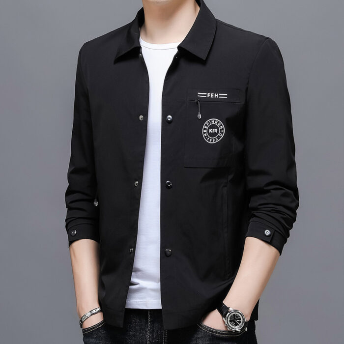 A stylish man wearing a sleek mens wrinkle free casual jacket for a smart everyday look.