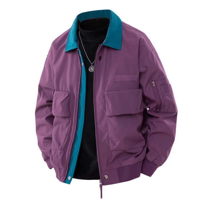 A stylish man wearing a loose fit mens retro pilot jacket for a casual streetwear look.