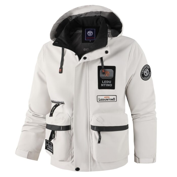 a3a8f933-d555-4740-8216-832d4a5ff596.jpg Close-up of the attached hood and premium lightweight fabric on a casual workwear jacket for men.
