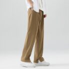 A stylish man wearing comfortable mens casual suit pants for a smart casual office look.