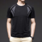A man staying cool in the summer heat wearing a breathable mens ice silk t shirt.