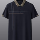 A professional man wearing a classic mens cotton polo shirt ph for a smart casual office look.