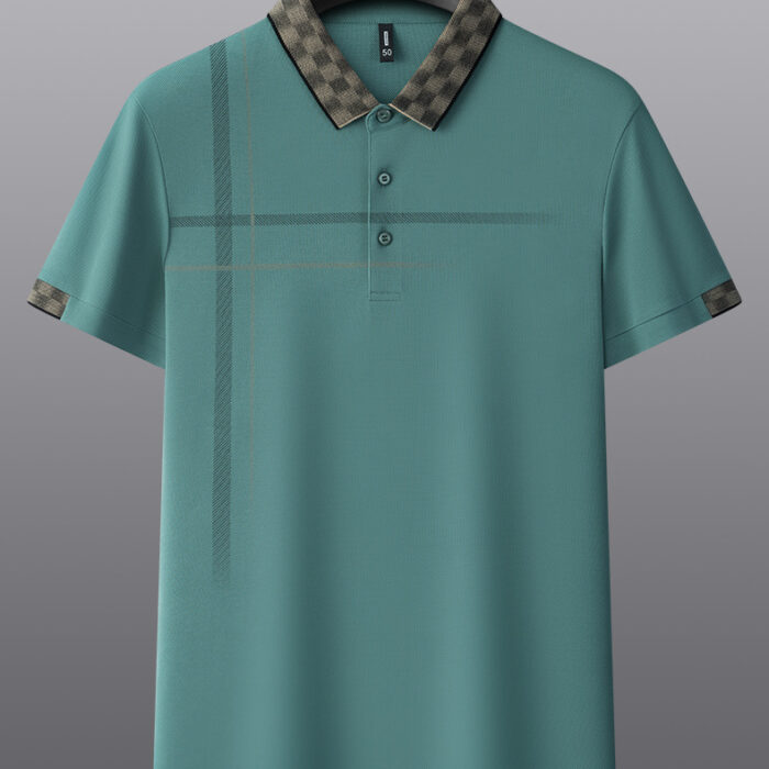 b244f950-b62d-4c45-83a4-e6cabf3218b5.jpg A professional man wearing a classic mens cotton polo shirt ph for a smart casual office look.